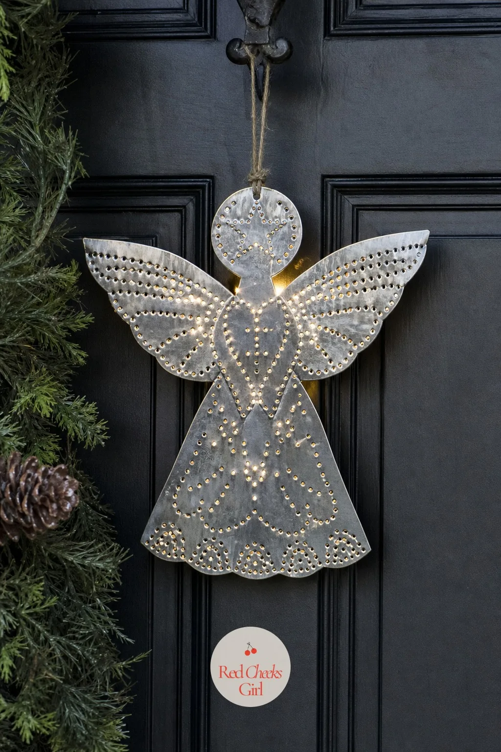 Punched Tin Lid Angel — A rinsed tin can lid, hammered flat and punched with a simple pattern of holes, throws a surprisingly pretty scatter of light once a
