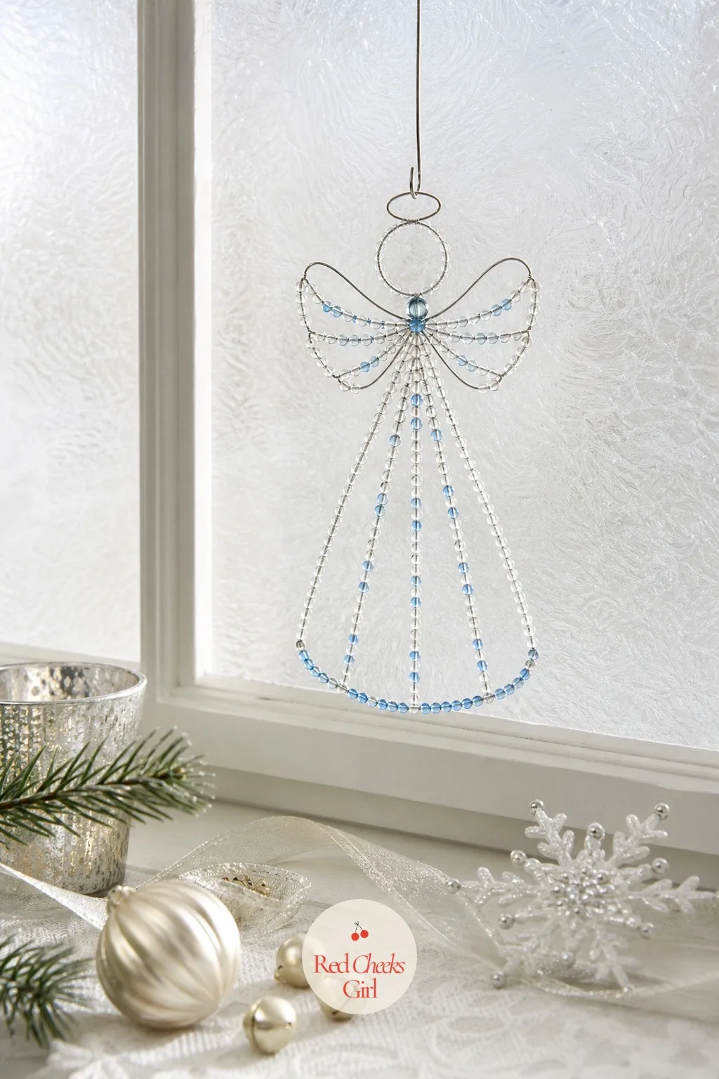 Seed Bead Angel Suncatcher — This one is built to be looked at from outside as much as in, since it catches morning light in a way nothing fabric based ever