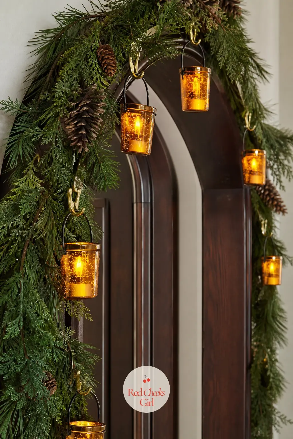 A Candlelit Lantern Archway with Amber Glass Votives — Line the inside curve of the arch with small brass hooks and hang a run of amber glass votive holders
