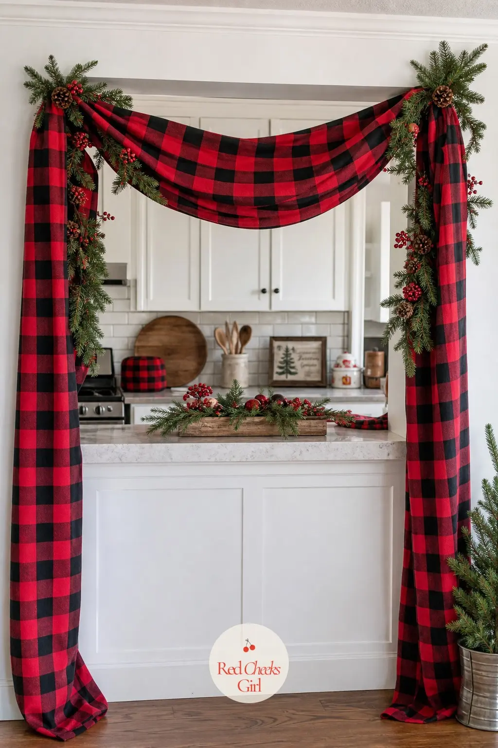 A Tartan Ribbon Drape Archway in Buffalo Check Red and Black — Buffalo check reads as Christmas without reading as a single other holiday, which is why it