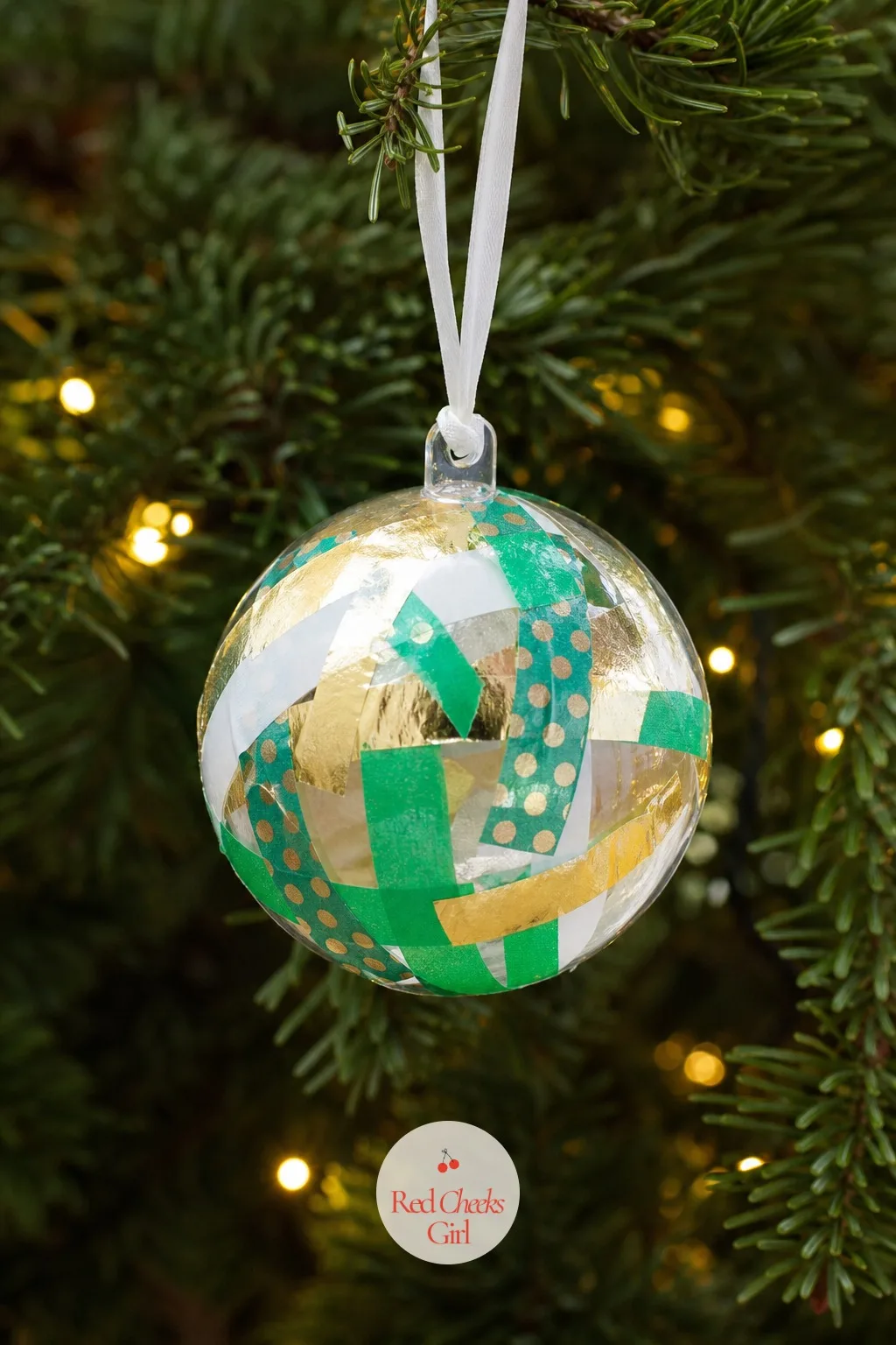 Washi Tape Stained Glass Baubles — Painting a round, slippery plastic bauble is a losing fight for small hands, and everyone knows it by the second drip.