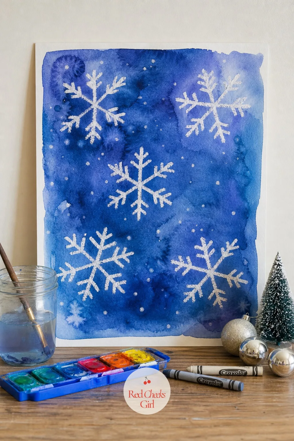 White Crayon Watercolor Resist Snow Scene — A blank sheet of watercolor paper intimidates a kid who thinks every stroke has to be perfect. Christmas arts and