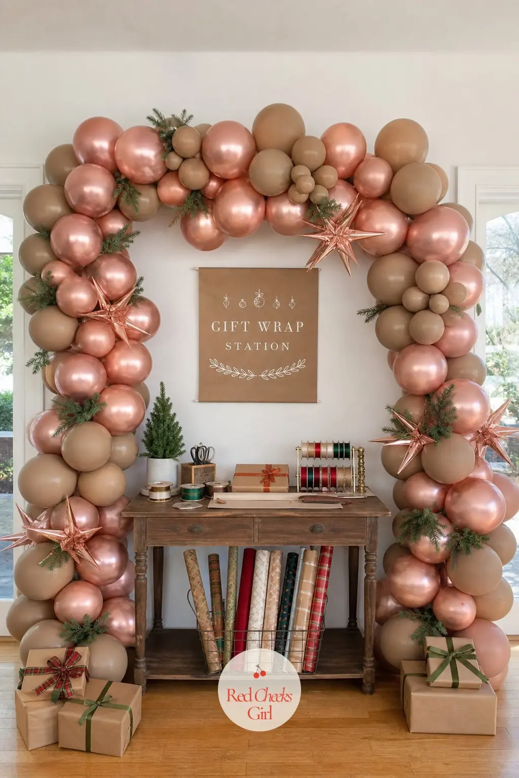 A Rose Gold and Kraft Brown Balloon Arch Framing the Gift-Wrap Station — The wrapping table is usually the messiest corner of the whole house during the