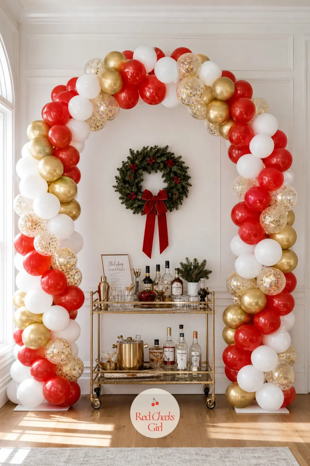 A Balloon Arch Framing the Bar Cart — A smaller arch, scaled to a cart rather than a doorway, curves over the bottles and glassware and gives the drinks