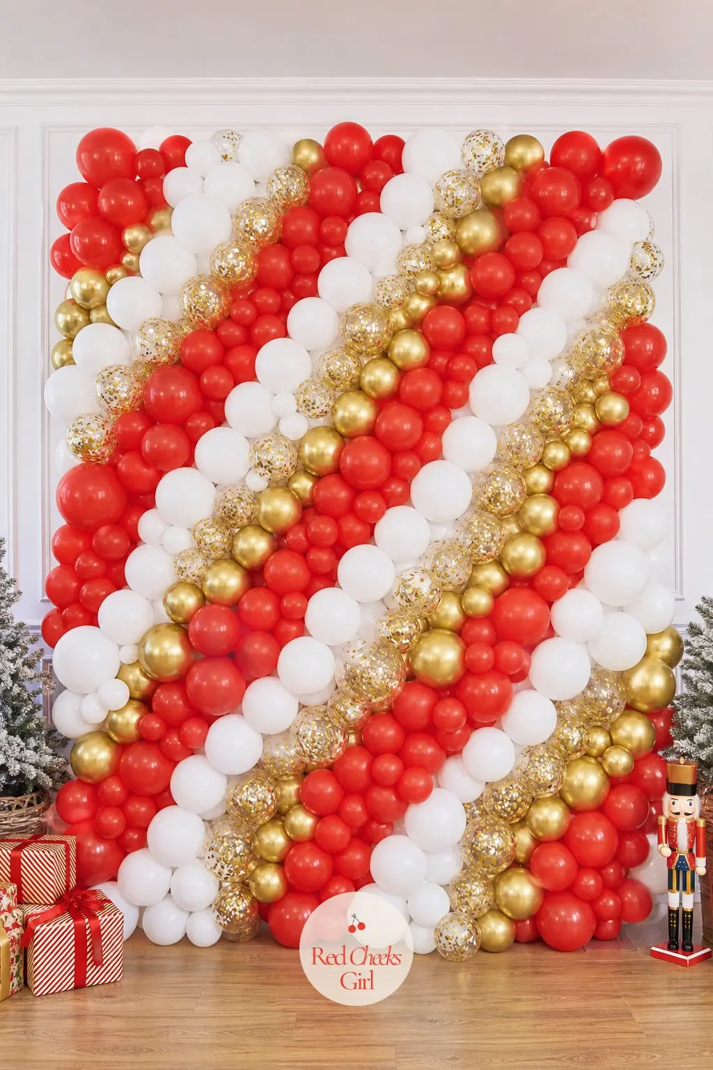 A Balloon Backdrop Wall in Candy Cane Stripes for Photos — A mosaic wall of tightly packed red, white and gold balloons fills a frame or a stretch of plain
