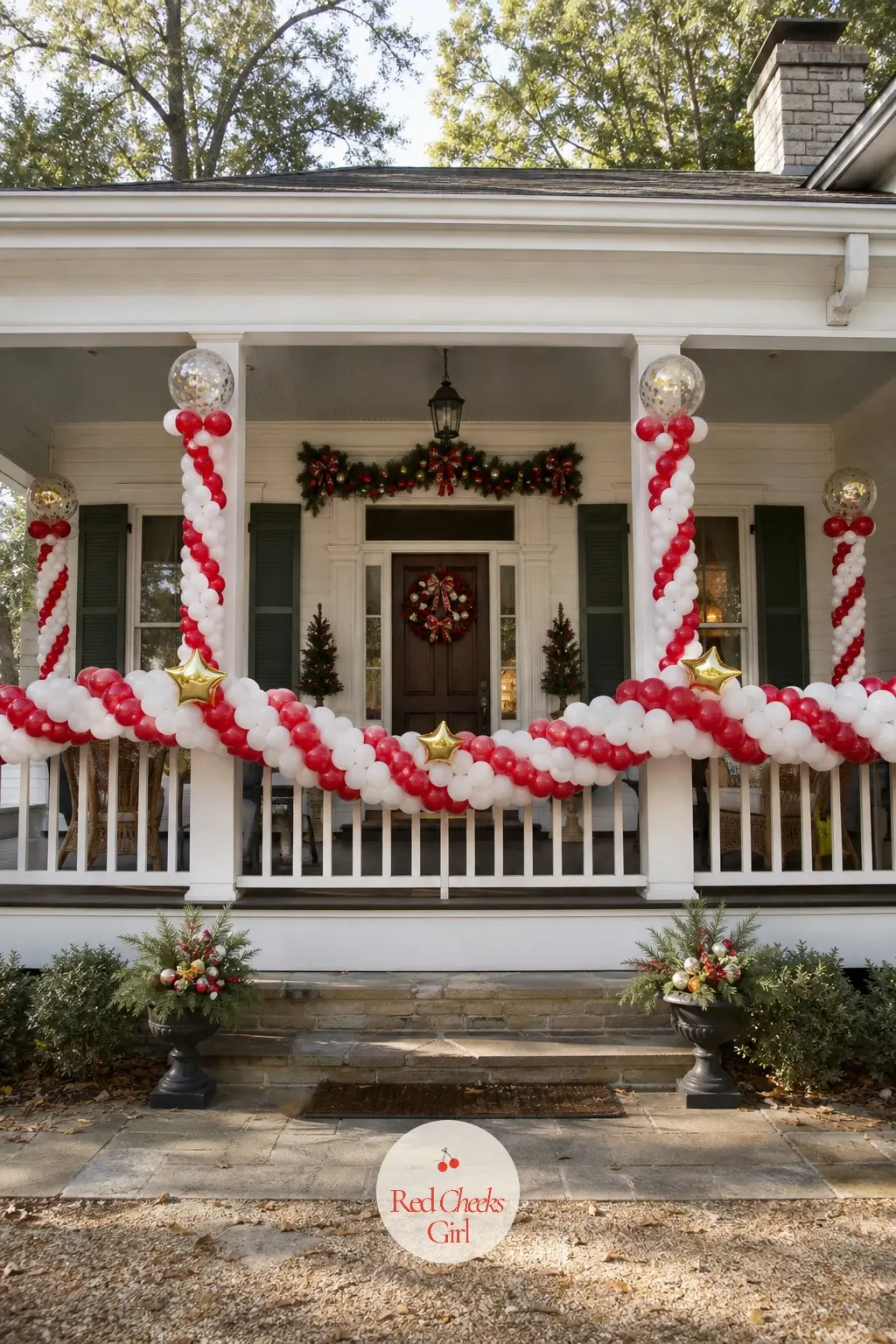 A Garland of Red and White Spiral Balloons Along the Porch Railing — A swag of hand-twisted spiral balloons strings along the porch railing like a soft-edged