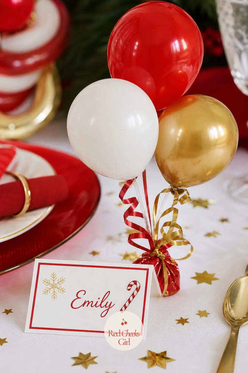 A Mini Balloon Bouquet Tied to Each Place Card — Three small balloons in red, white and gold bunch together on a short ribbon beside each folded place card