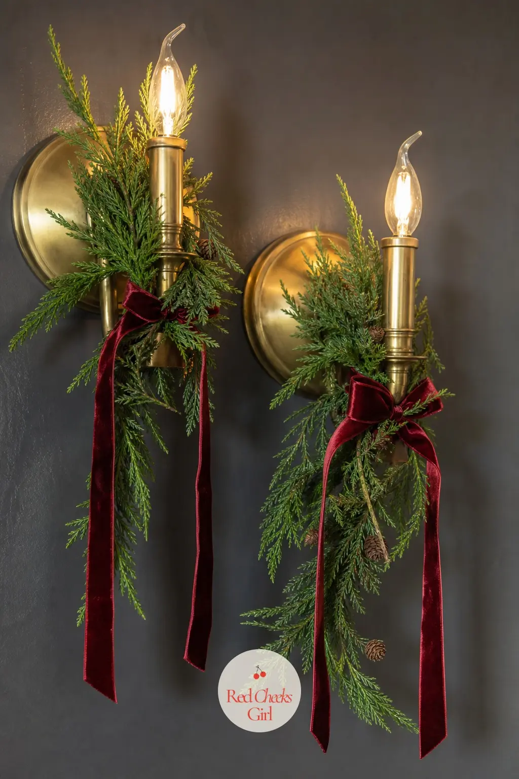 A Pair of Brass Sconces Wrapped in Cedar and Velvet Ribbon — If the headboard wall already has sconces either side, wind a short length of fresh cedar around