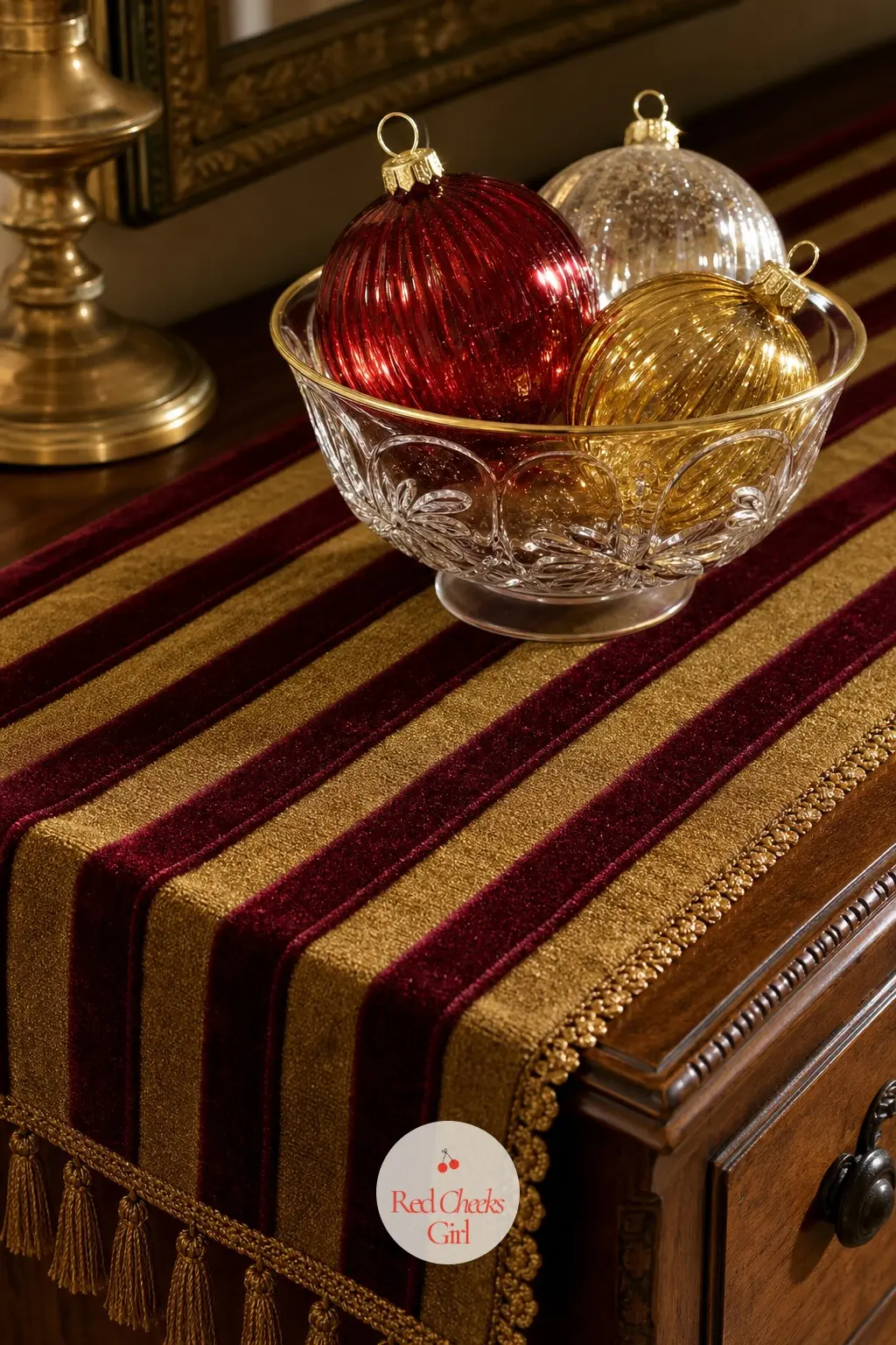 A Striped Velvet Dresser Runner Topped With a Bowl of Glass Ornaments — Lay a striped burgundy and gold velvet runner along the dresser top and set a single