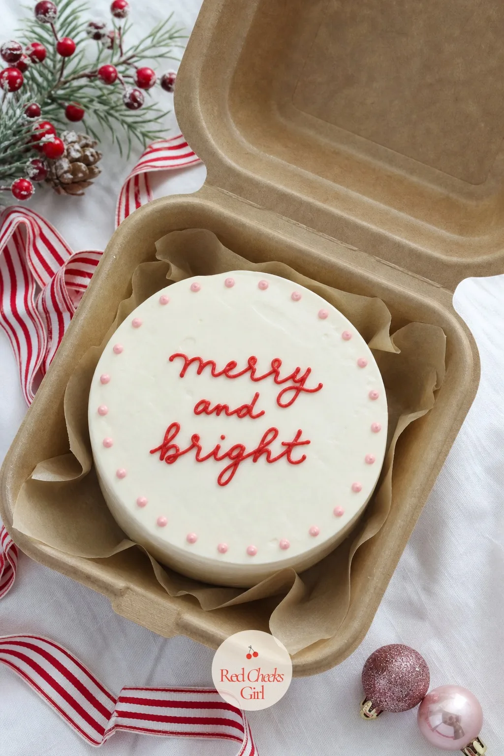 Merry and Bright Lettering Bento — No face to get wrong, no shape to balance, just two words in a steady hand. Christmas bento cake