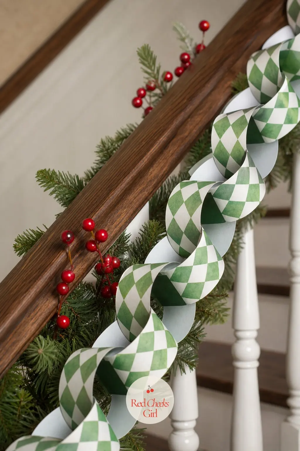 Green and White Harlequin Bunting — A paper chain of interlocking rings, each strip carrying a different scale of green and white harlequin diamond: large bold