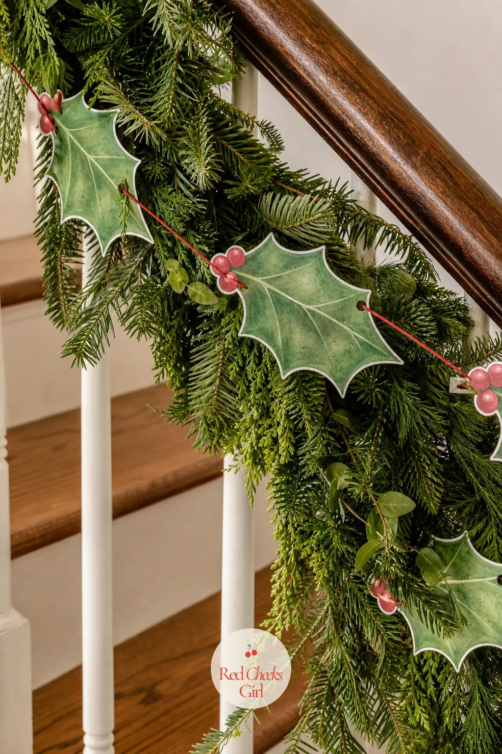 Holly and Berries Bunting — A holly leaf silhouette rather than a flag, deep green with a small cluster of red berries drawn near the stem end. Christmas