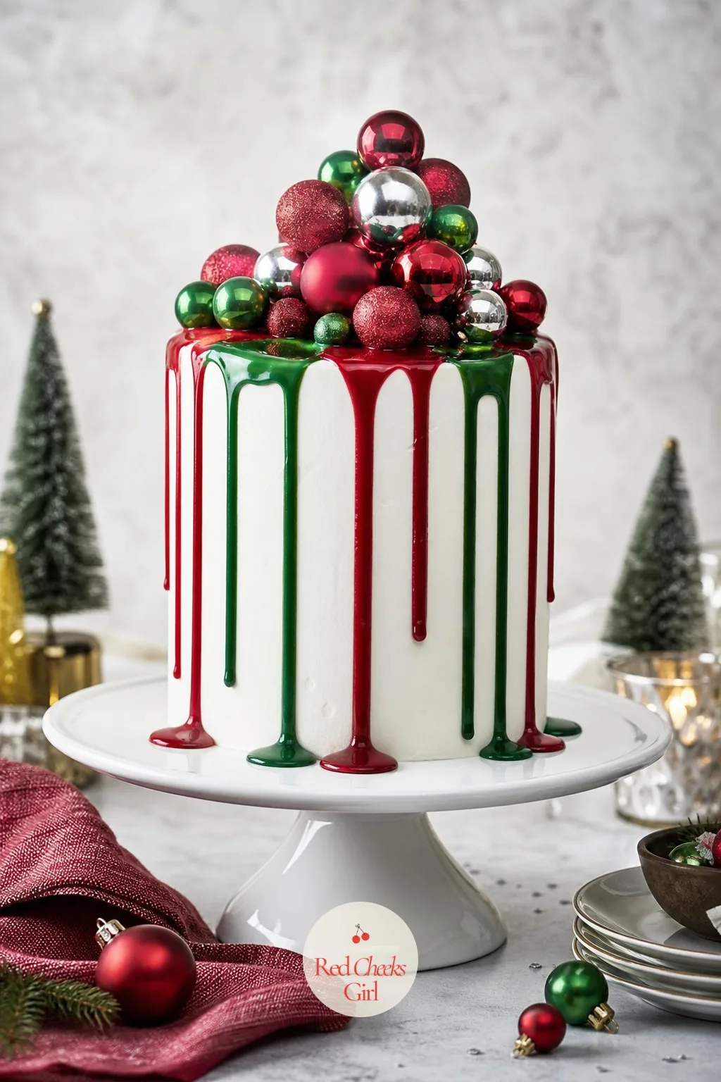 Ornament Drip Cake — Glossy drip cakes look like they belong behind a bakery counter, intimidating from the outside. Christmas cake designs