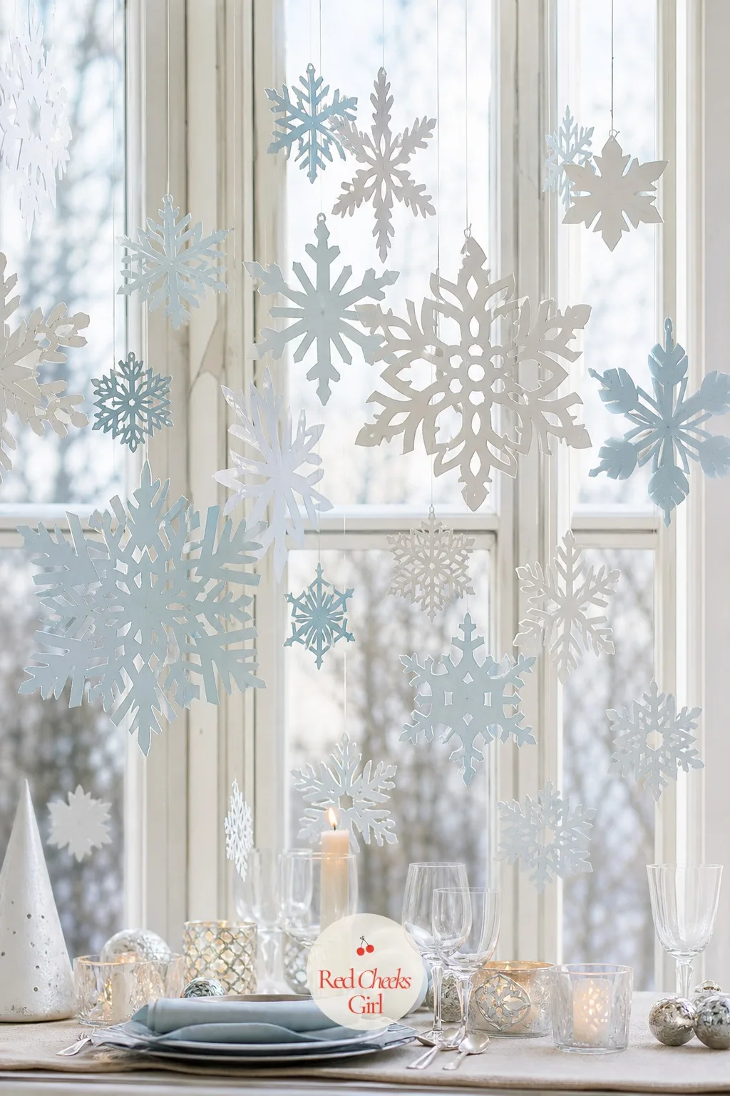 The Giant Cardboard Snowflake Cluster — One paper snowflake sticker looks a little lonely against a full-height window. Christmas cardboard crafts