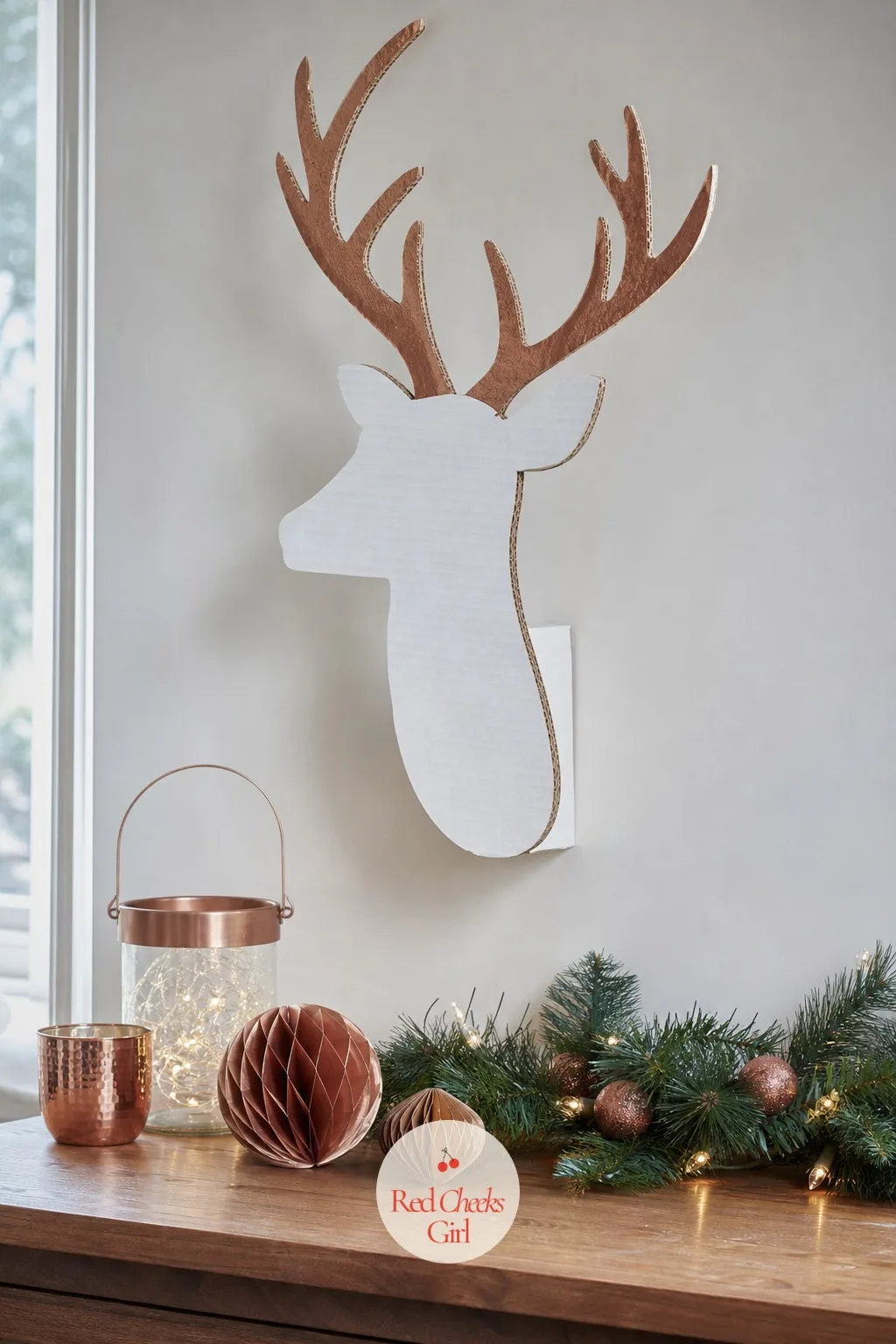 The Wall-Mounted Reindeer Silhouette — A taxidermy head over the console table is not everyone's idea of festive, and most landlords agree. Christmas cardboard