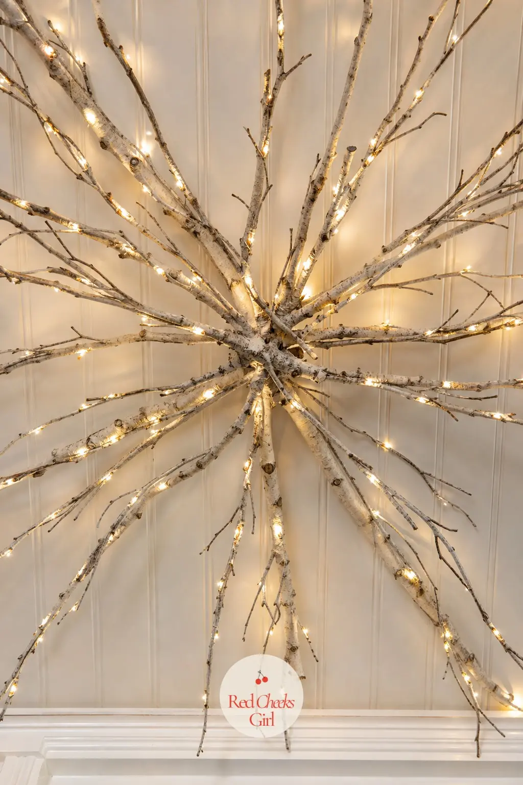 A Ceiling-Mounted Starburst of Birch Twigs Wrapped in Warm Micro Lights Over the Entry — Bundle bare birch twigs into a loose starburst, wire the centre flat