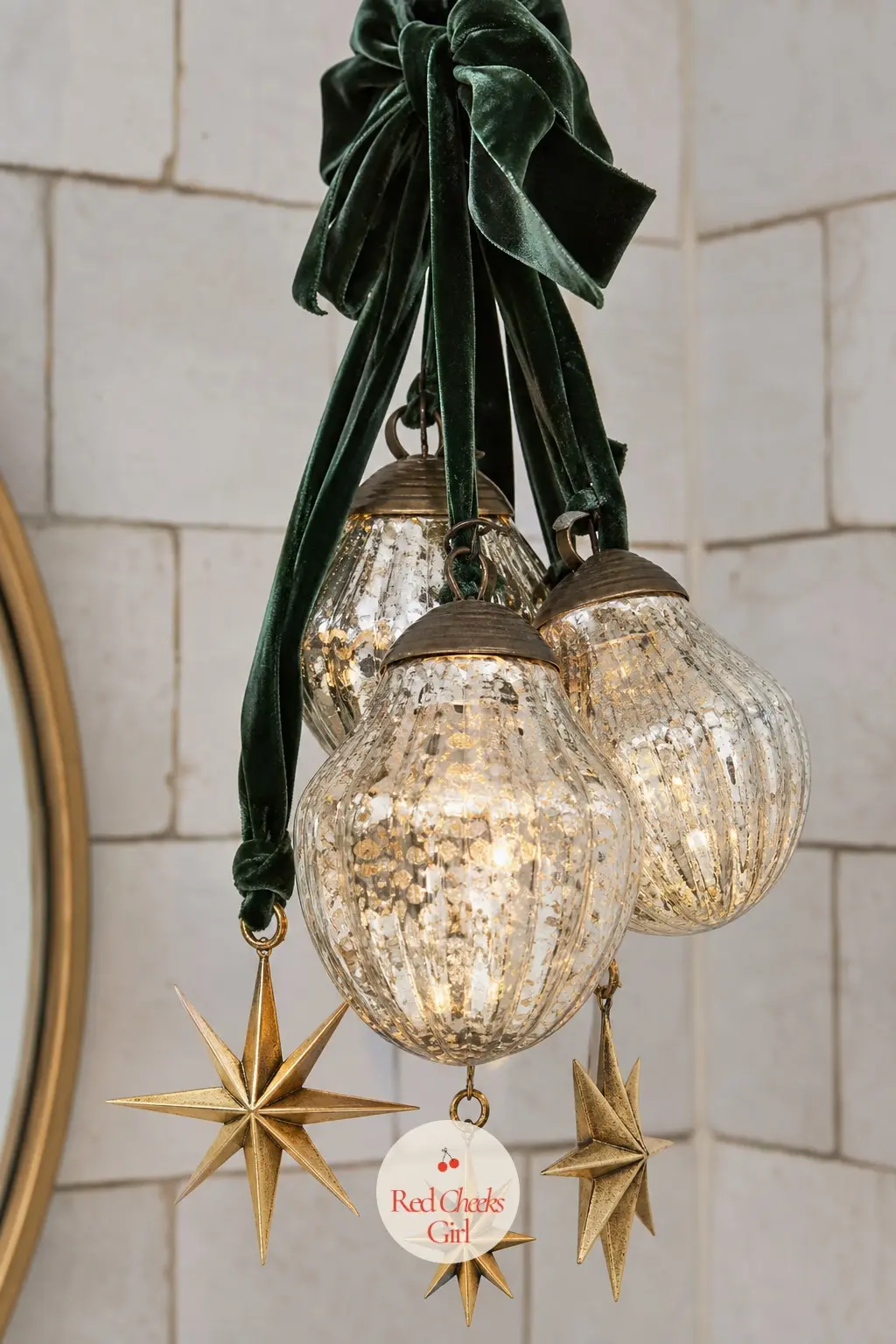 Emerald Ribbon and Gold Star Pendant Cluster — A powder room pendant cluster gets seen for thirty seconds at a time, so make those seconds count with emerald
