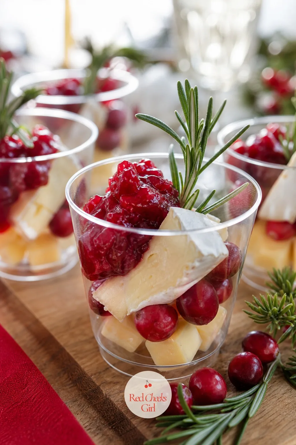 Cranberry Brie Cup — Warm brie against cold cranberry sauce is the combination that makes people stop mid sentence. Christmas charcuterie cups