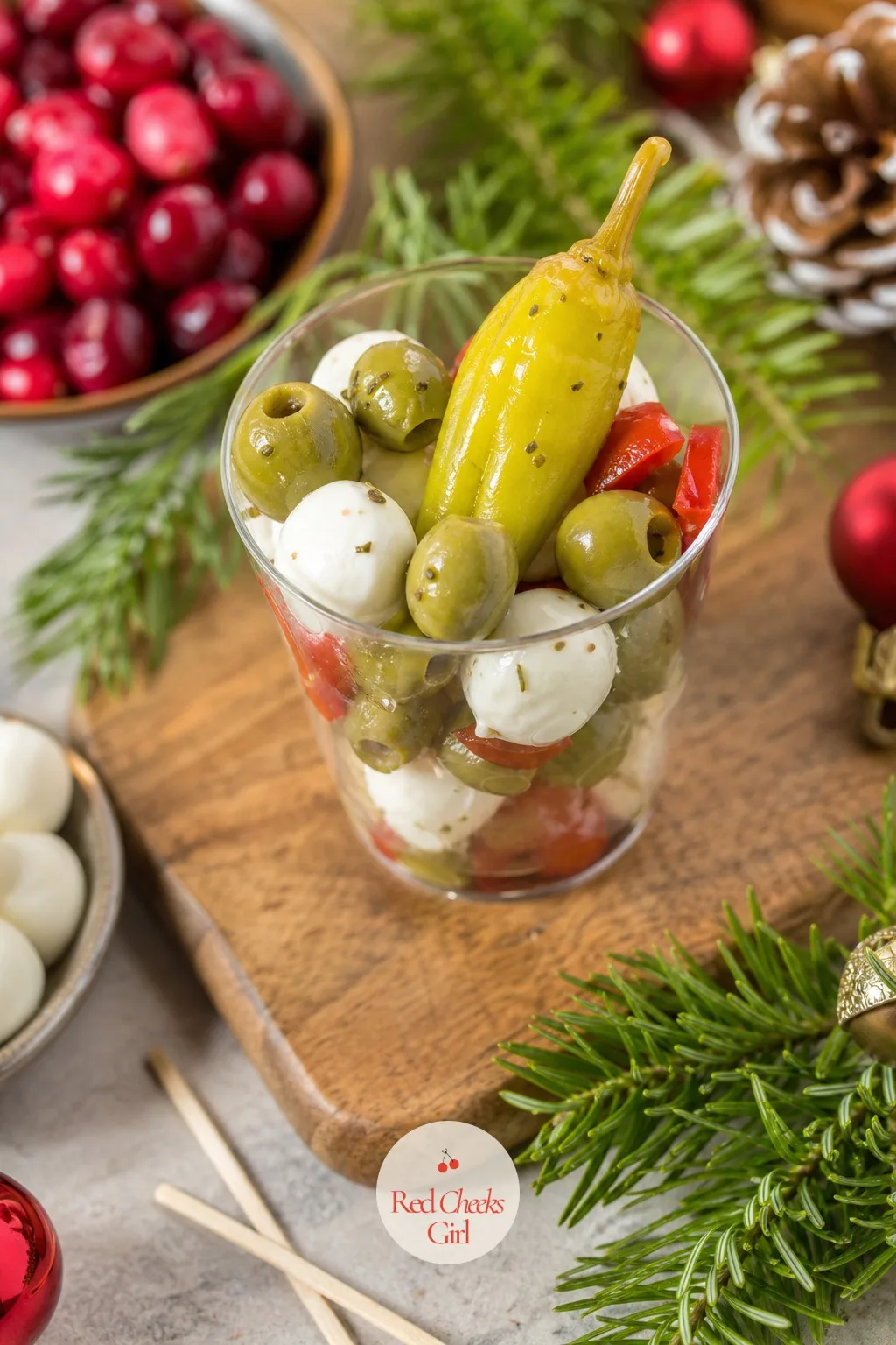 Italian Antipasto Cup — Green olives, a curl of pepperoncini and a scatter of cream coloured mozzarella pearls: this cup tastes like the good platter at a