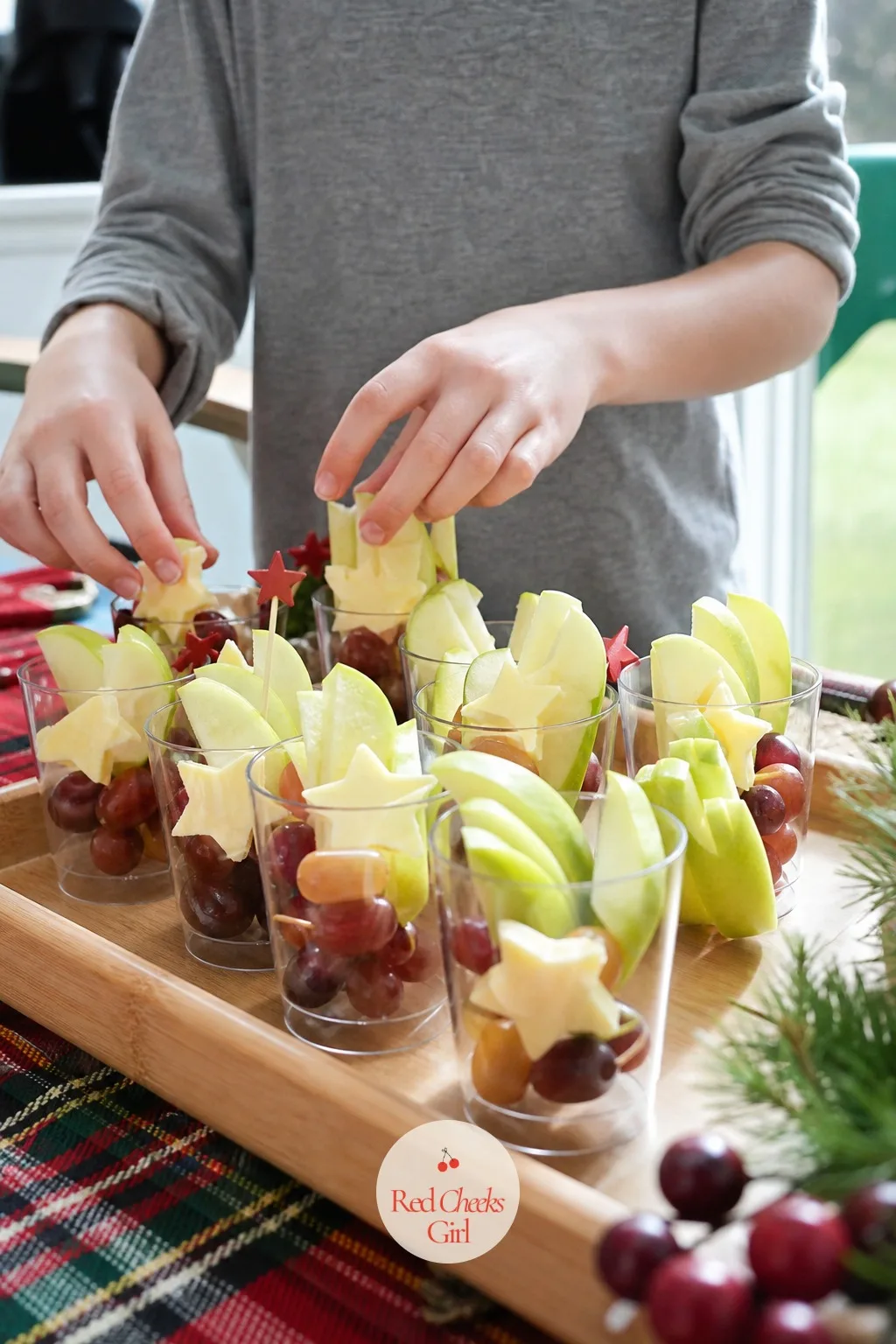 Kids Cheese Cup — No olives, no pickled anything, nothing that needs explaining to a seven year old. Christmas charcuterie cups