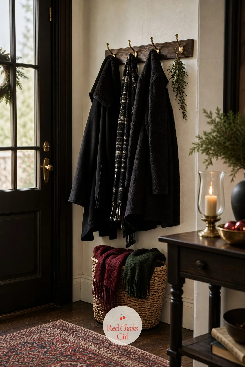 A Coat and Wrap Corner Near the Door — A pile of coats on a bed upstairs is the first unglamorous thing a guest sees. Christmas cocktail party ideas