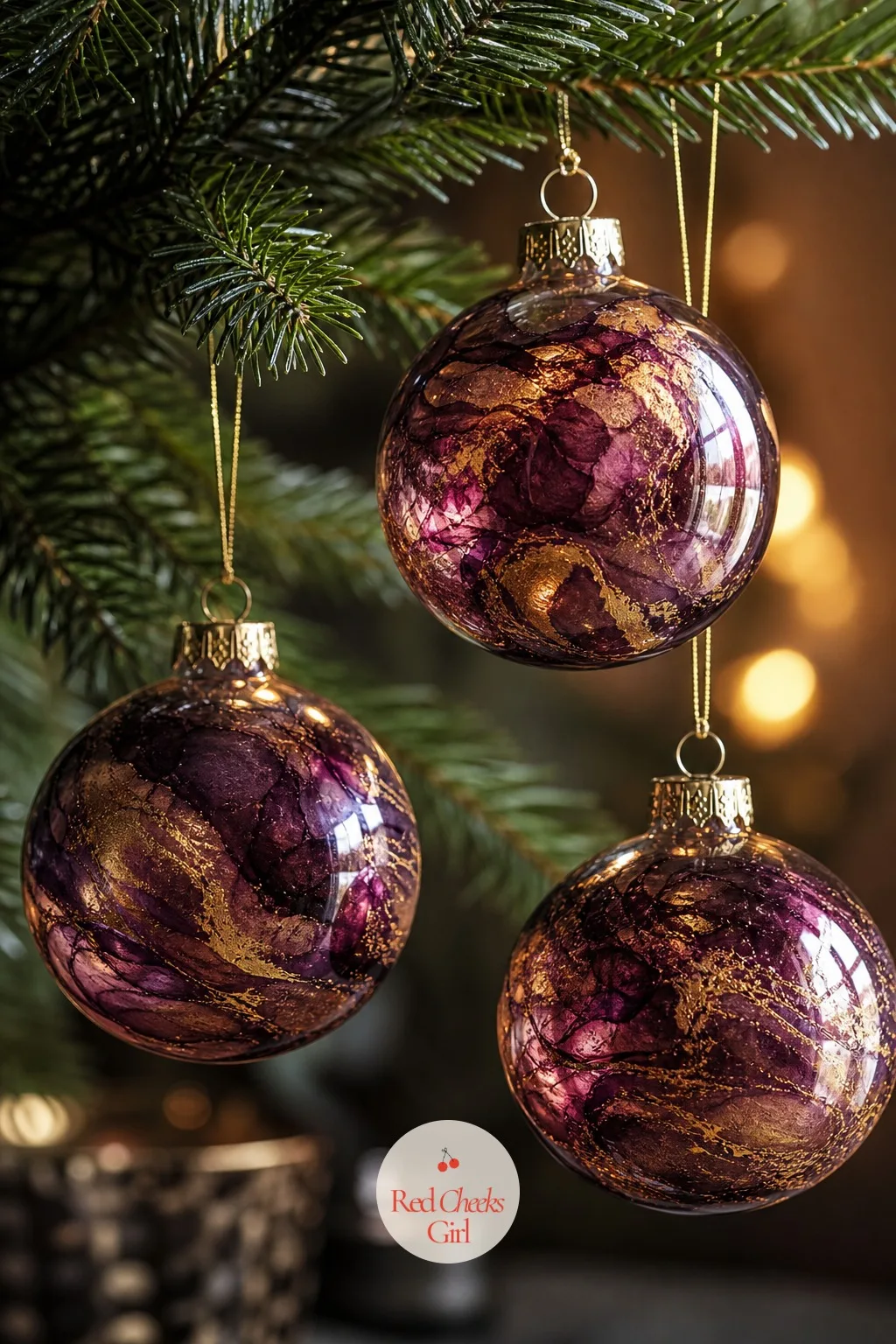 Marbled Alcohol-Ink Baubles — Plain glass balls from the supermarket multipack look thin once the lights hit them, and you know it the second you hang one.