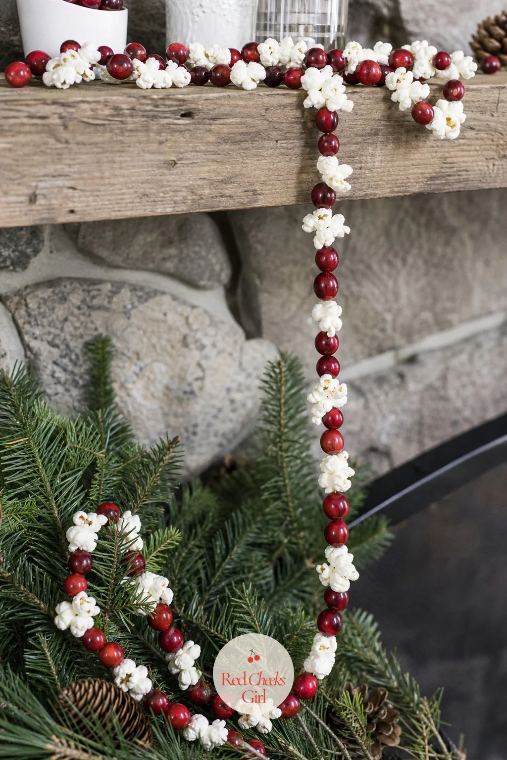Cranberry and Popcorn Mantel Garland — A long needle threaded with popcorn and fresh cranberries in alternating runs makes a garland that drapes along a mantel