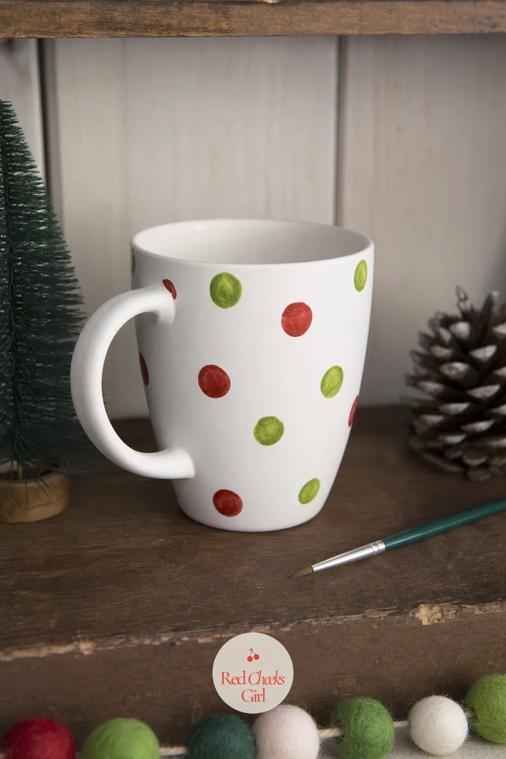 Painted Ceramic Cocoa Mug — A plain white mug and a set of oven-bake paint pens turn into the mug grandma actually reaches for, not the one left in the back of