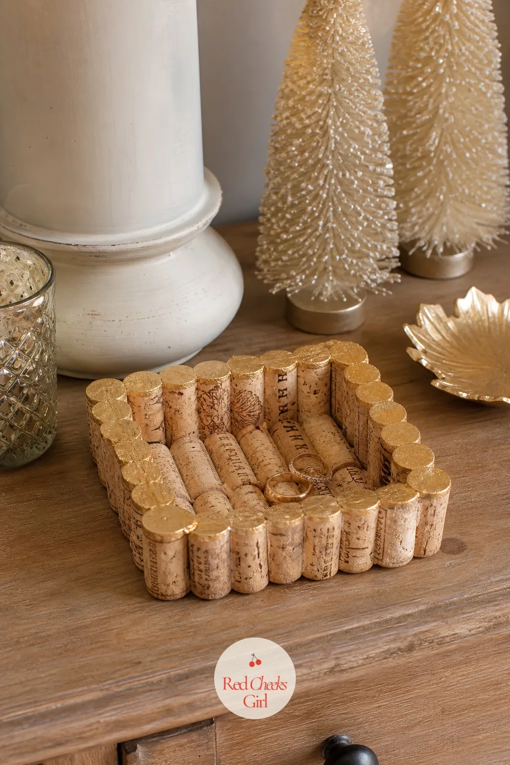 Wine Cork Trinket Tray — Saved wine corks glued flat side down into a small tray shape, edges painted gold, make a dish for rings and earrings that costs