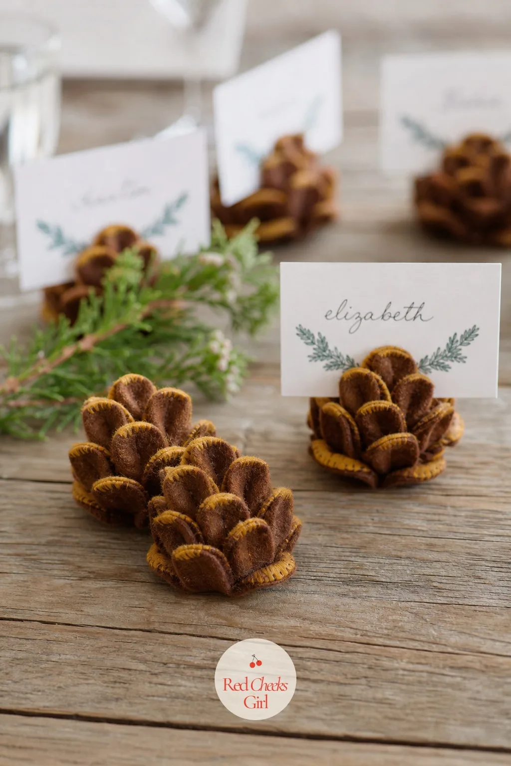 Felt Pinecone Place Card Holders — Place cards usually mean a printer, a font decision, and card stock that slides every time someone reaches for the bread.