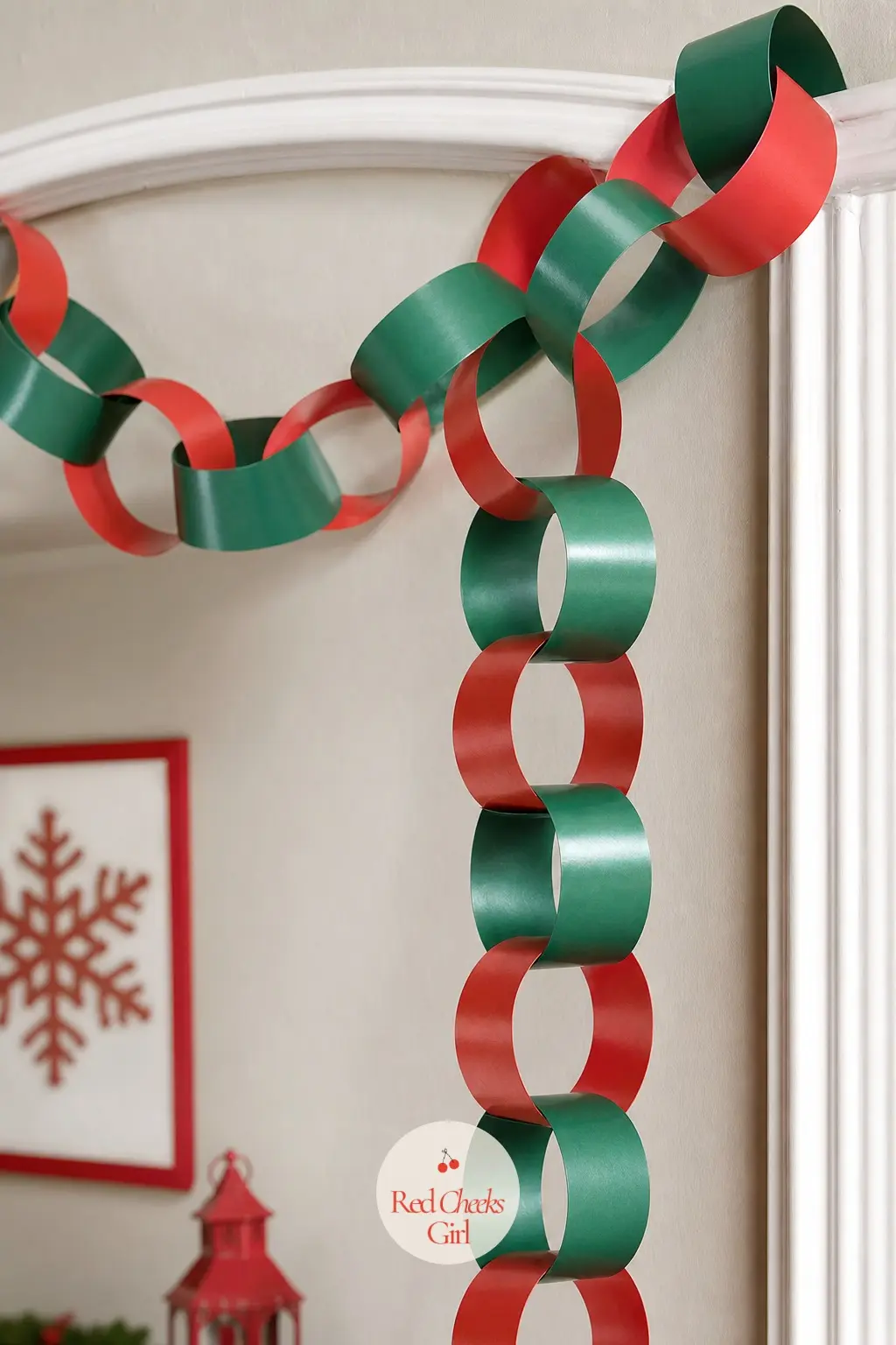 Retro Paper Chain In Red And Green — A looping red and green paper chain strung across a hallway archway costs almost nothing and takes about twenty minutes to