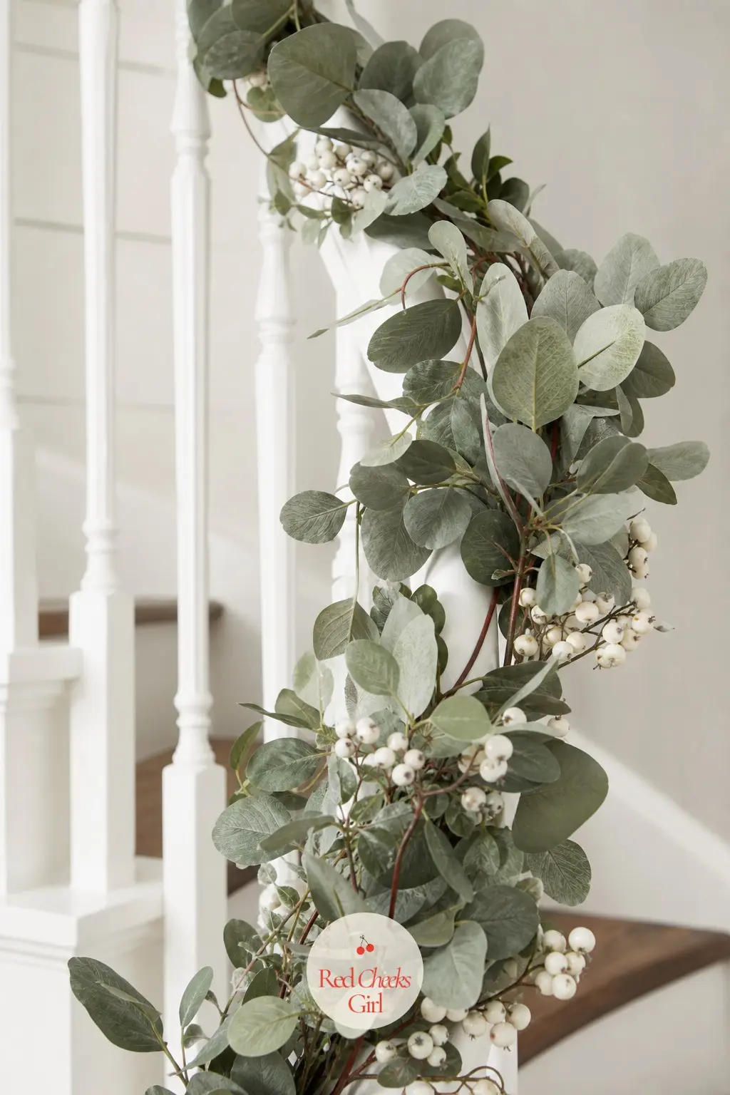 Eucalyptus and White Berry Garland — Eucalyptus brings a soft, almost grey-green color that reads calmer than pine, and small white berries tucked in at