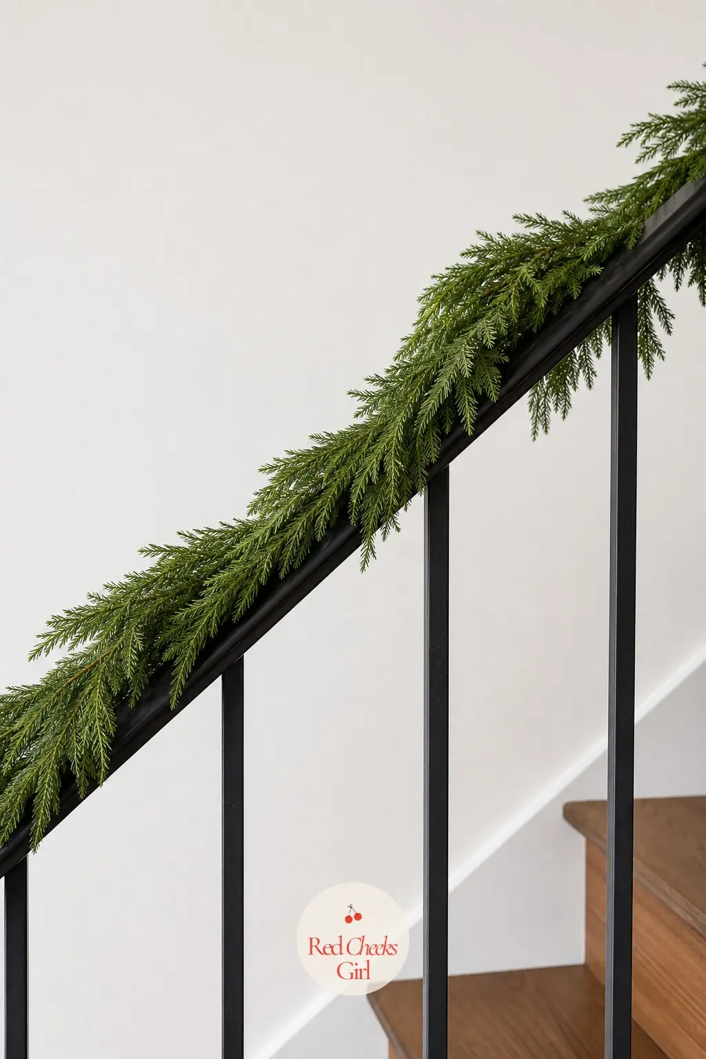 One Simple Strand for a Minimalist Rail — Sometimes the most styled thing you can do is add less. Christmas garland staircase