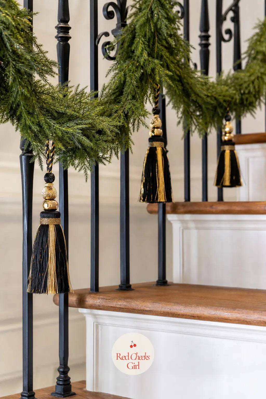 Tassels Hanging at Each Swag — Keep the garland itself plain, a muted, even green with no embellishment, and let a single black and gold tassel hang from the