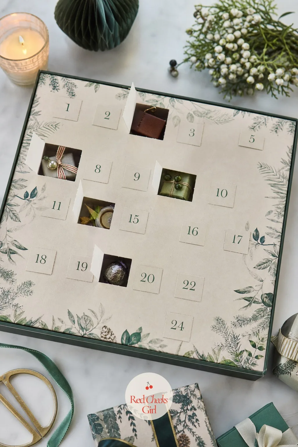 Advent-Style Window Box for a Week of Small Gifts — For the person getting several small presents rather than one, a single large box with cut paper windows
