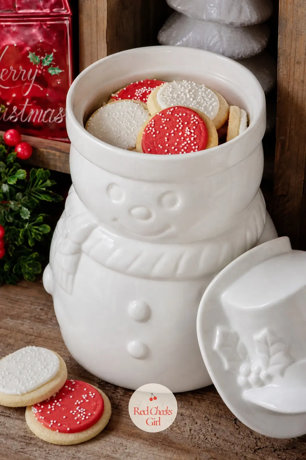 A Milk-Glass Snowman Cookie Jar Filled With Iced Butter Cookies — A milk-glass cookie jar shaped like a snowman is the kind of thing that only comes out once a