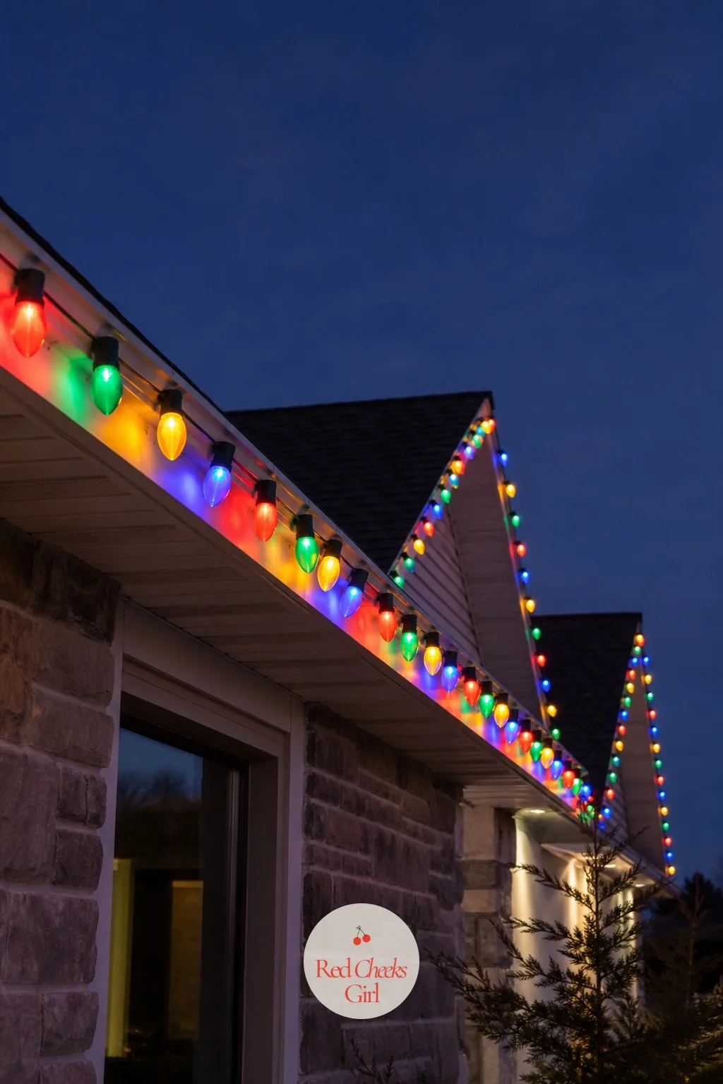 Oversized Multicolor C9 Bulbs Across the Whole Roofline — This is the full nostalgic statement, the one that looks like a house from a memory rather than a