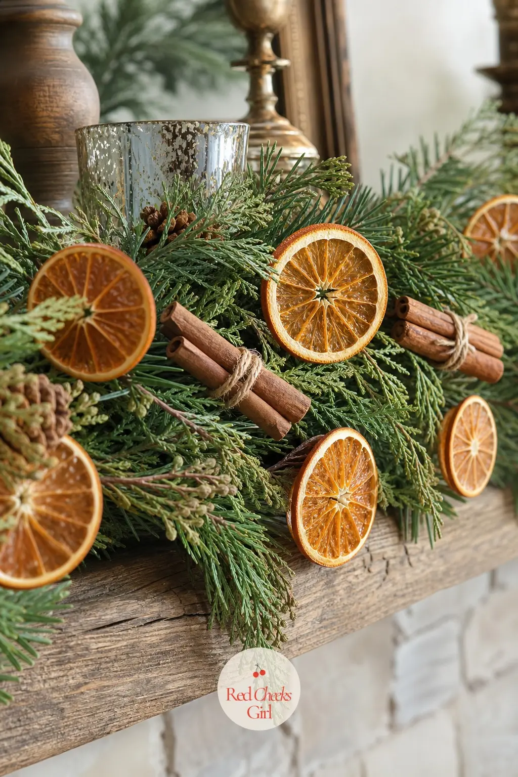 A Garland Threaded With Dried Orange Slices and Cinnamon Sticks — This one brings its own scent to the room, no diffuser required. Christmas mantle decor