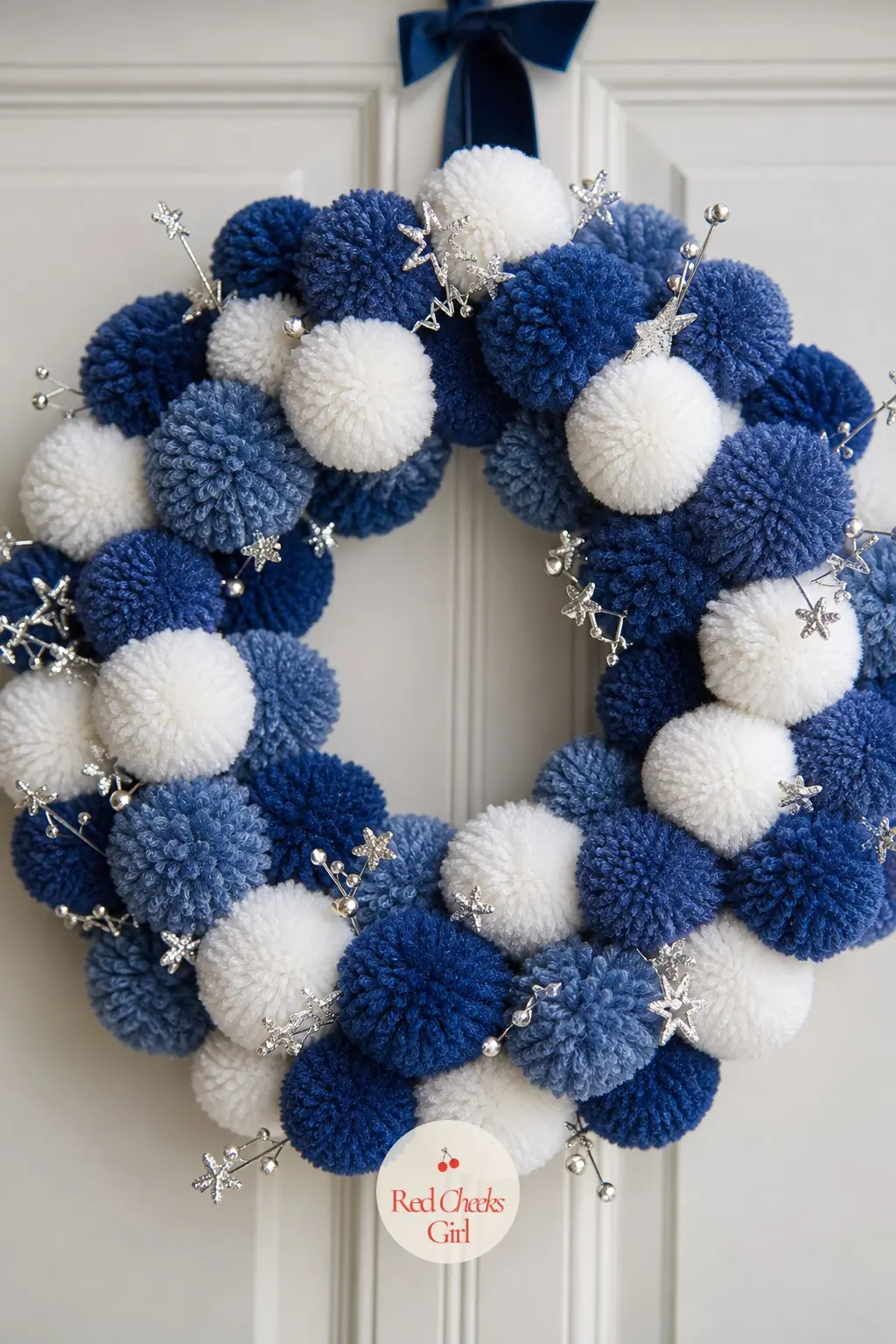 The Blueberry Blue and White Pom Pom Wreath for the Laundry Room Door — Blueberry blue is deep enough to hide a bit of dust and lint, which makes it a sensible