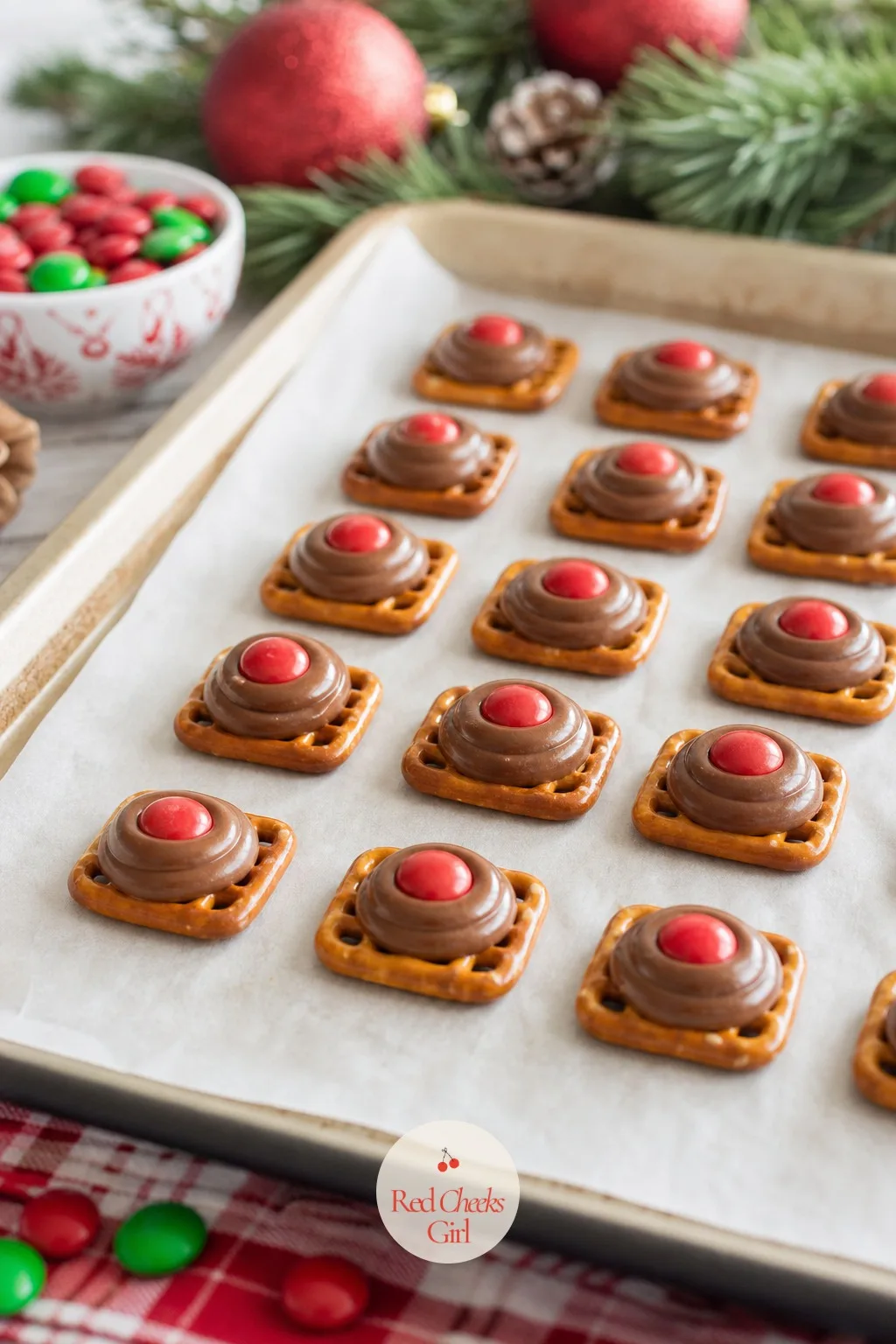 Pretzel Hugs with Chocolate Kisses — This is the famous three-ingredient one, and it earns the reputation. Christmas pretzel treats