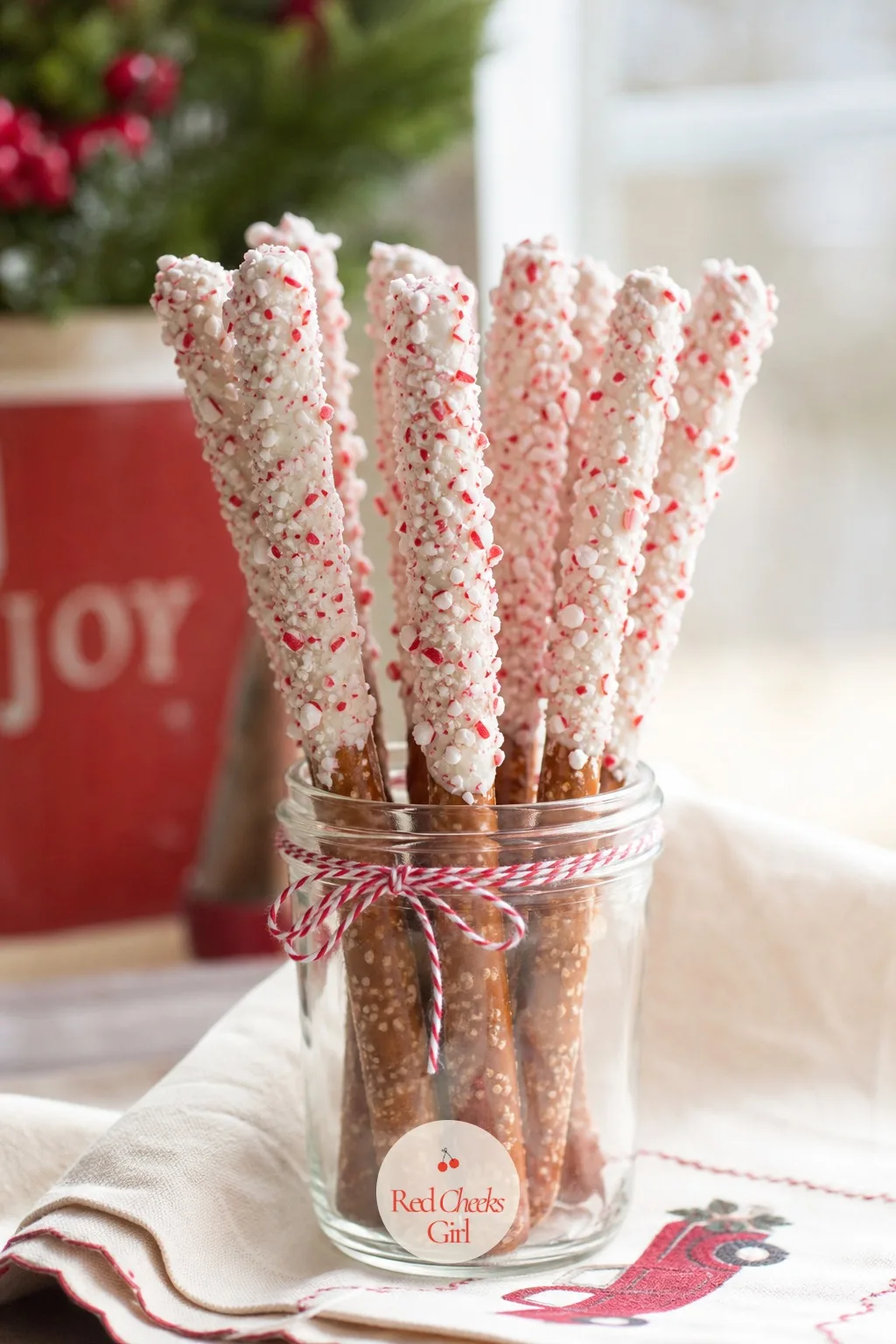 White Chocolate Dipped Pretzel Rods — This is the one to start with if nobody in the house has dipped a pretzel before. Christmas pretzel treats