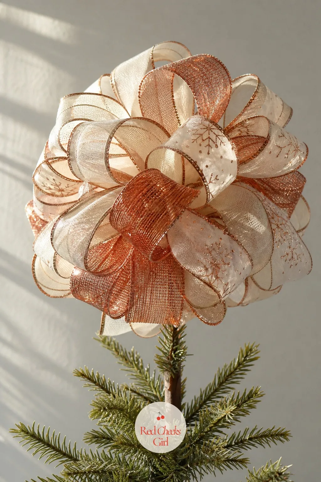 Layered Ribbon Loop Tree Topper — A single bow on top looks lonely once the branches below fill in with lights and ornaments. Christmas ribbon crafts