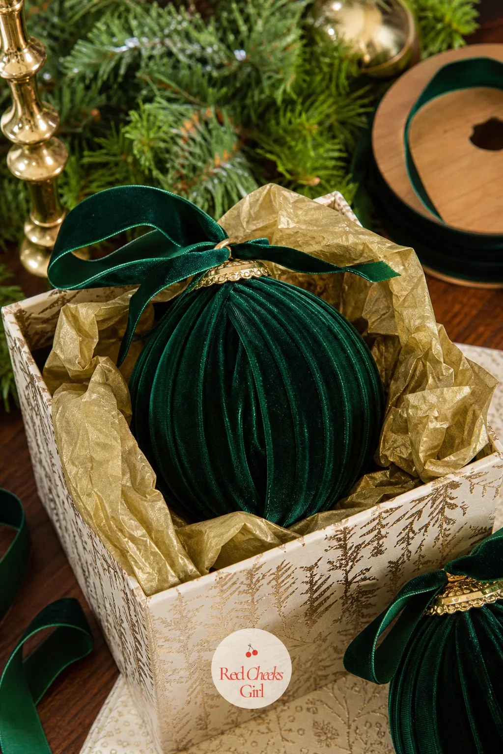 Pleated Velvet Ball Ornaments — A plain glass ball looks like it escaped from a bulk box, until a wide velvet ribbon wraps it in soft overlapping folds.