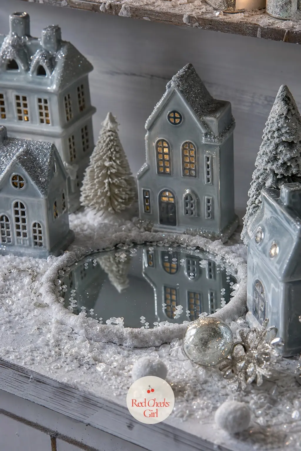 A Blue Grey Snow Village With Mica Snow and a Resin Pond — Keep the whole village in cool blue grey and white rather than the usual warm cream, and add a small