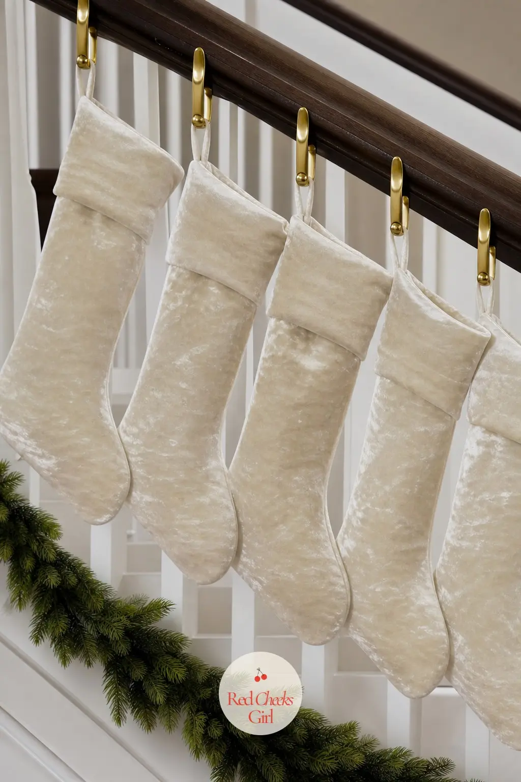 A Row of Cream Velvet Stockings Clipped to the Rail With Brass Hooks — Plain cream velvet stockings, no pattern and no trim beyond a single cuff, hang in an