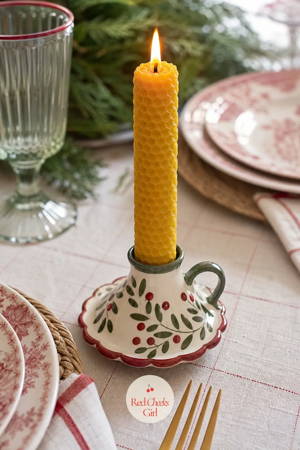 A Beeswax Taper in a Painted Ceramic Holder at Every Place — One small taper per guest, each in its own hand-painted ceramic holder, means the light is