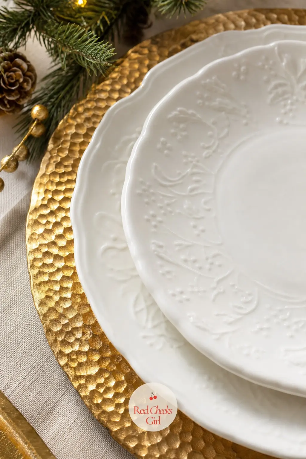 Hammered Gold Chargers Stacked Beneath White Porcelain — A hammered charger does the heavy lifting a tablescape needs without adding a single extra object to