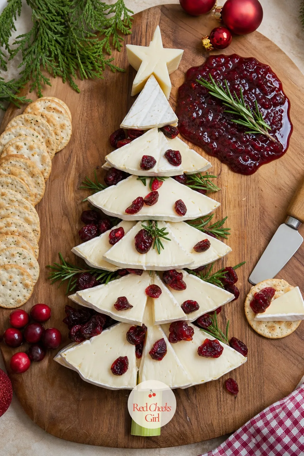 Brie and Cranberry Tree — This is the elegant one, the board you put out when the conversation has slowed down and people are on their second glass. Christmas