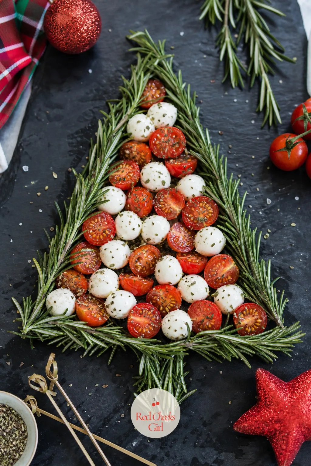 Rosemary Tree with Mozzarella Balls — Skip the crackers-as-outline trick and use fresh rosemary sprigs instead: it gives the whole board a smell before anyone