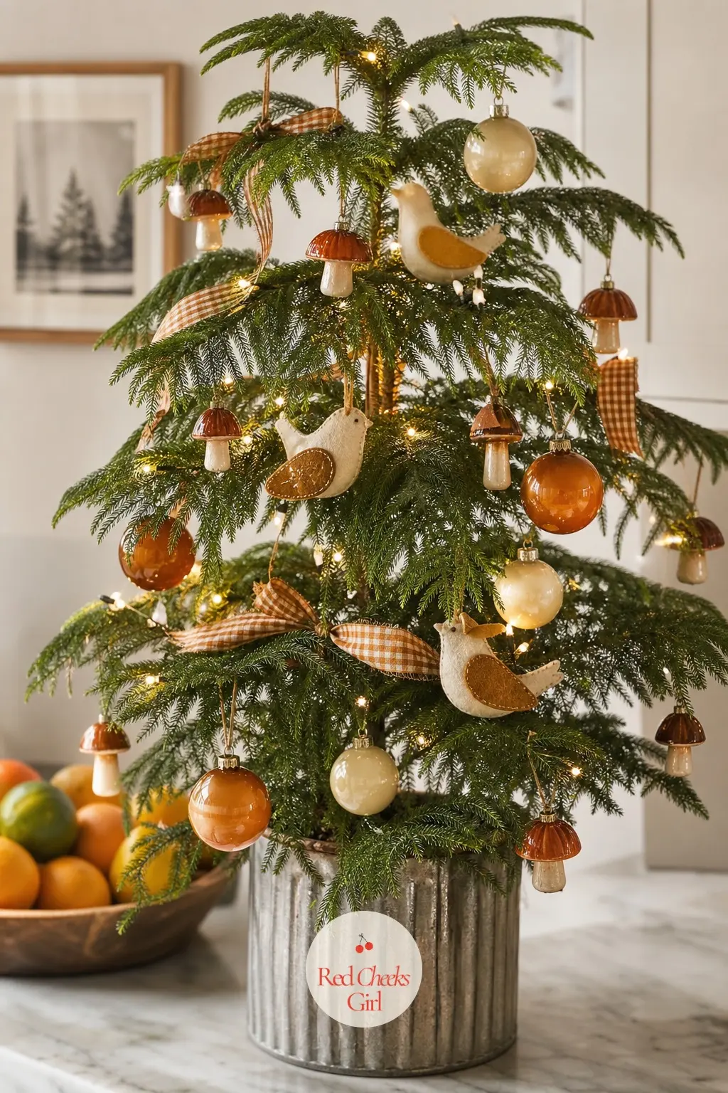 The Potted Pine with a Mushroom Colony — A small potted Norfolk pine swaps bulk for charm: amber and cream glass balls, a real colony of glass mushroom
